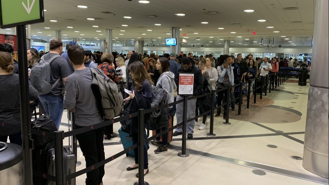 What do you do while you’re waiting in line at the Airport?